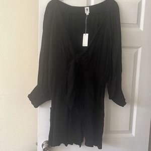 NWT! Black long sleeve romper with tie front.